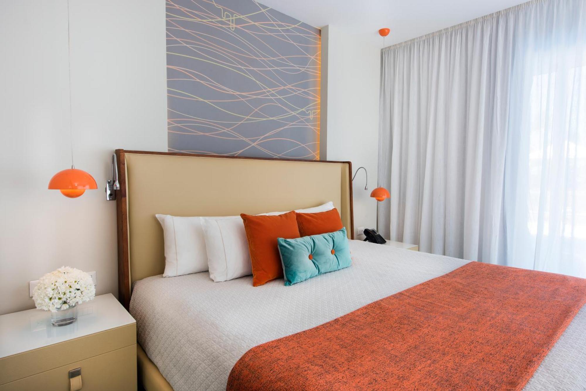 Nickelodeon Hotels & Resorts Punta Cana Rum bild A bedroom at the hotel
